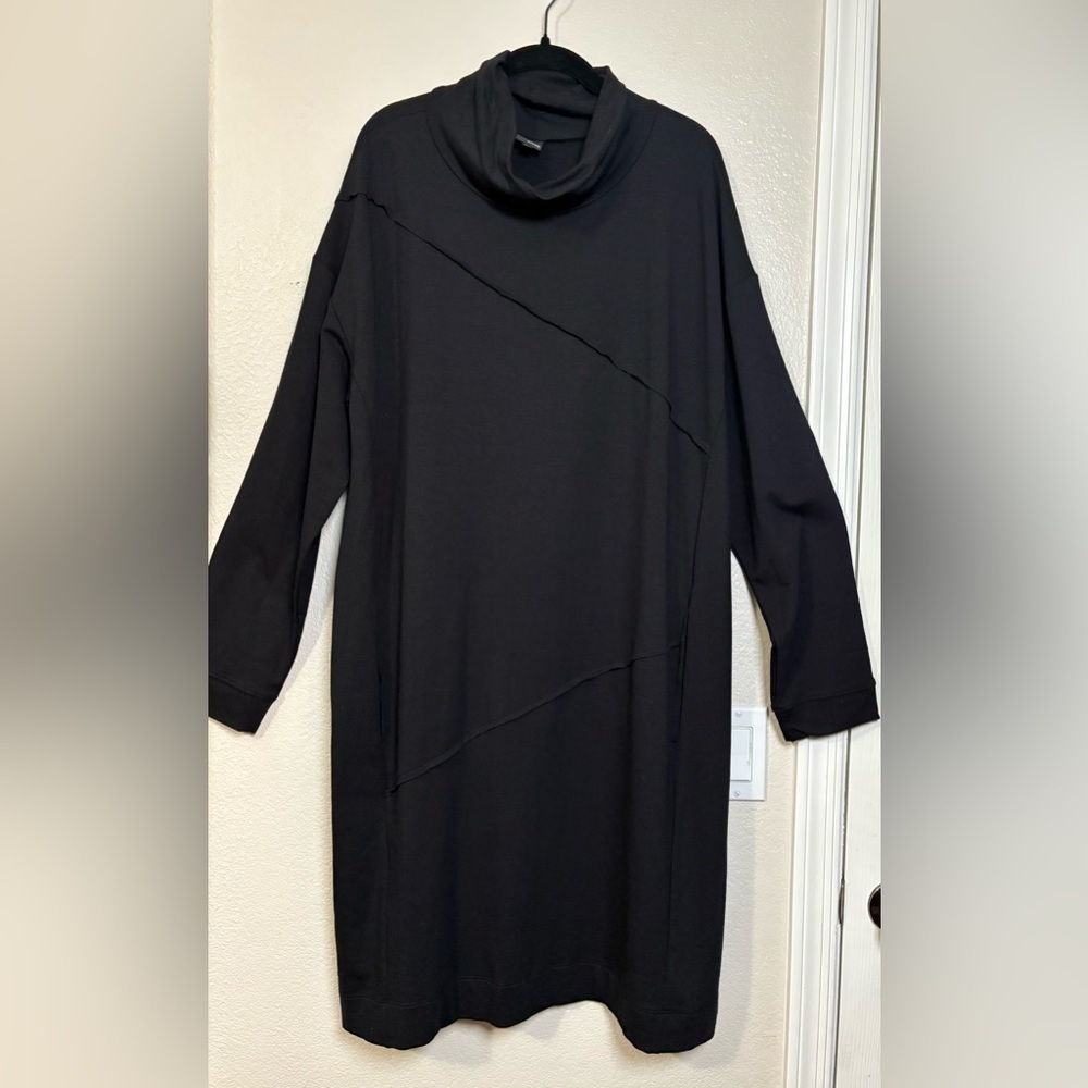 Lisa Bayne Chic Black Long Sleeve Dress with Pockets and Asymmetric Design.